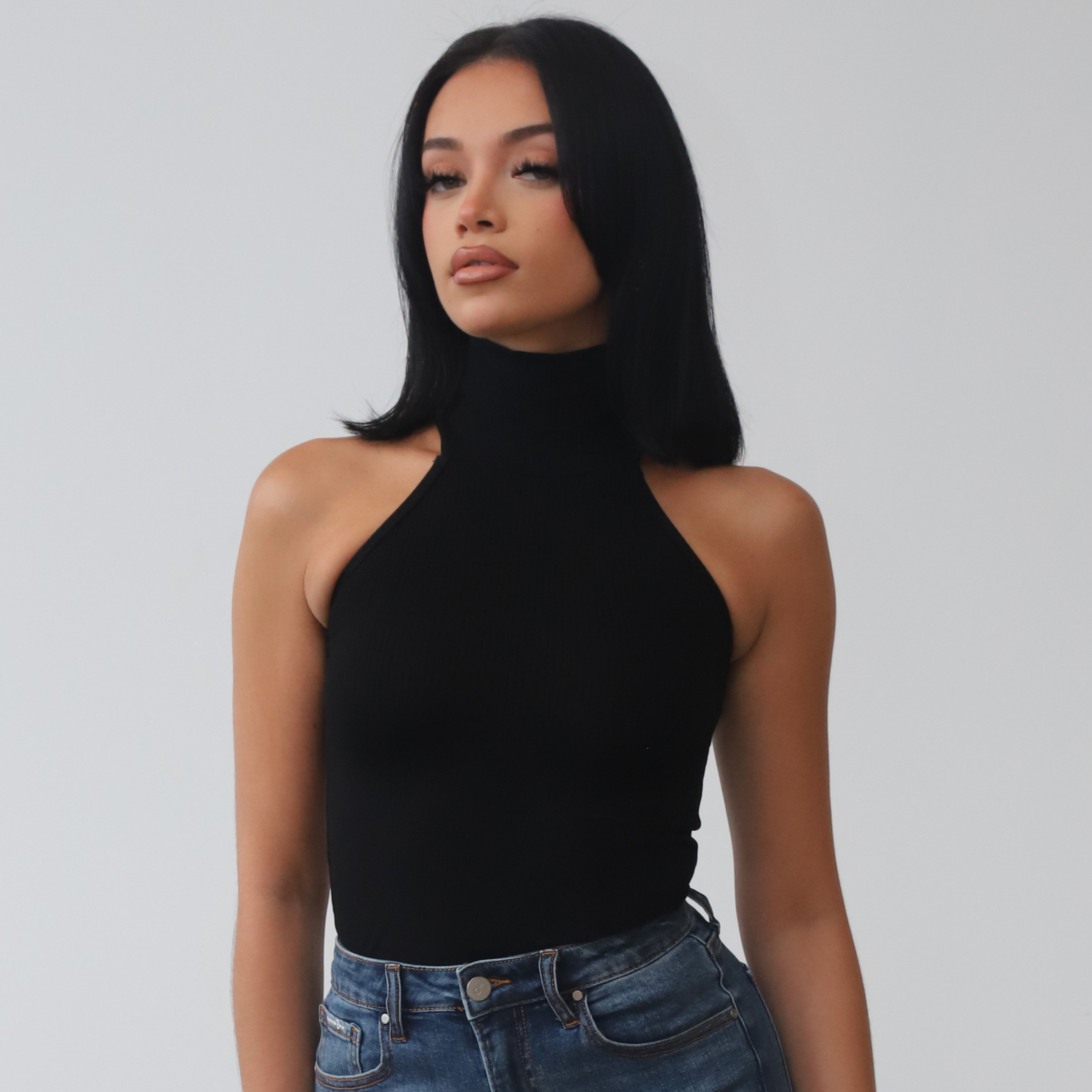 Black Sleeveless Turtleneck Top