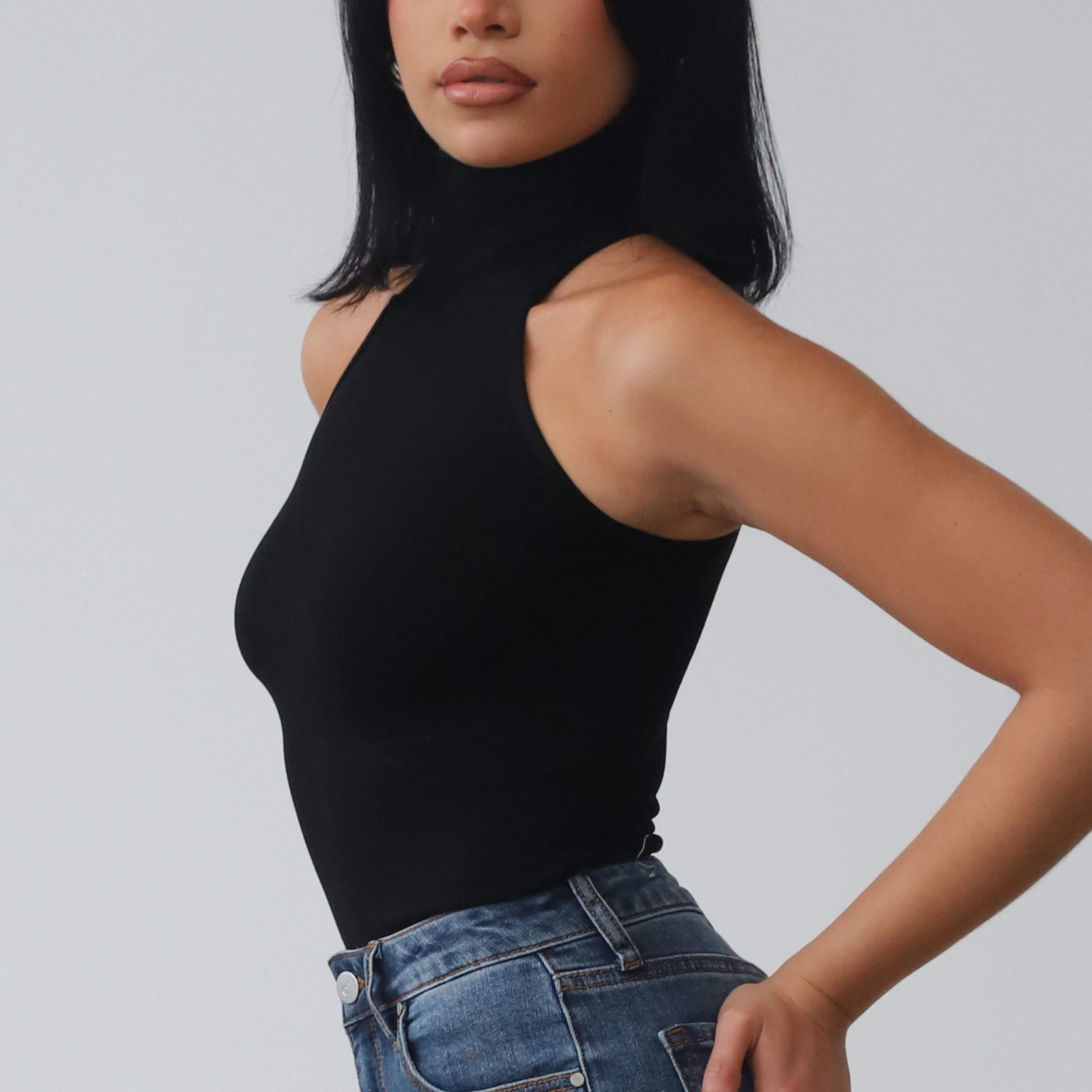 Black Sleeveless Turtleneck Top